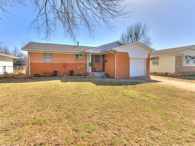 ranch-style home with brick siding, fence, concrete driveway, a front yard, and an attached garage