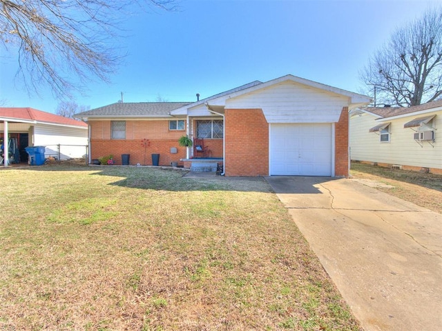 ranch-style house featuring a front yard, an attached garage, brick siding, and driveway