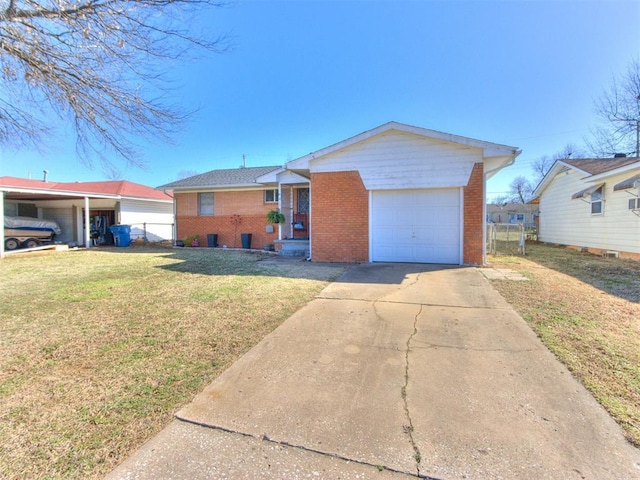 ranch-style home with a front lawn, an attached garage, brick siding, and driveway