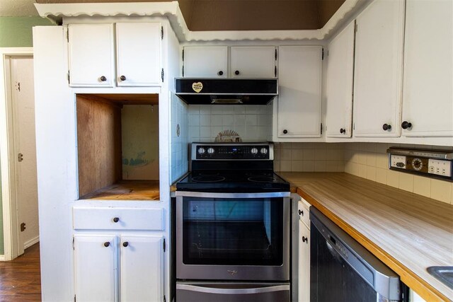 kitchen featuring under cabinet range hood, tasteful backsplash, dishwashing machine, white cabinets, and stainless steel electric range oven