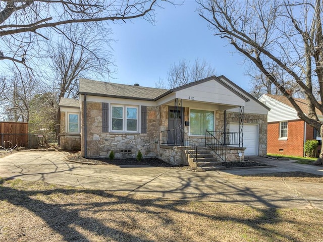 ranch-style home with a porch, a garage, stone siding, and crawl space