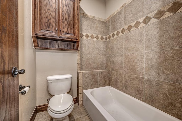 full bathroom featuring tile patterned flooring, toilet, and baseboards