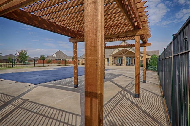 view of pool with a residential view, a pergola, and fence