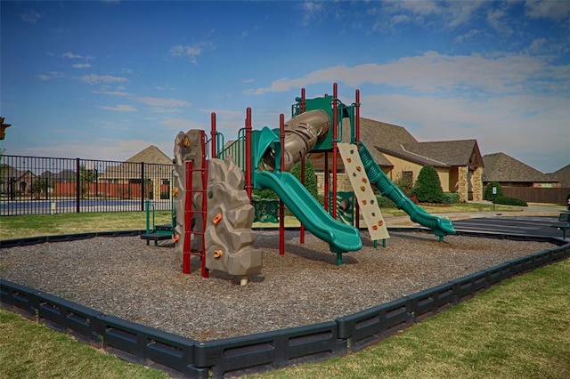 community play area featuring fence