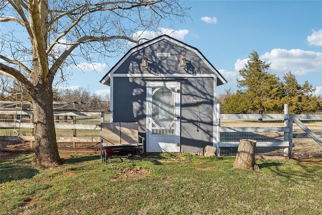 view of shed with fence