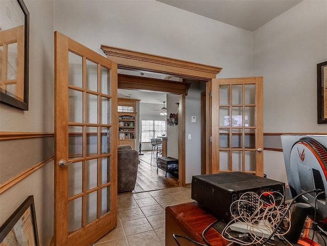 interior space featuring french doors and tile patterned flooring