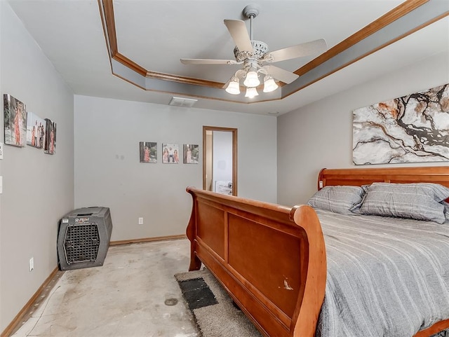 bedroom with visible vents, a tray ceiling, unfinished concrete flooring, baseboards, and ceiling fan