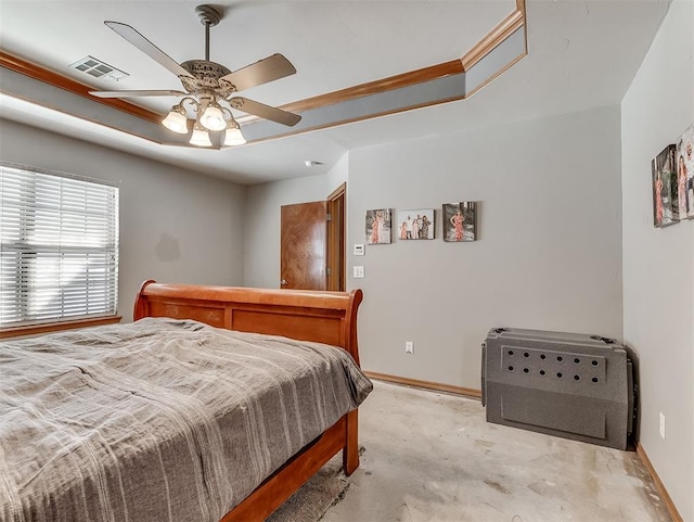 bedroom featuring visible vents, ceiling fan, baseboards, concrete flooring, and a raised ceiling