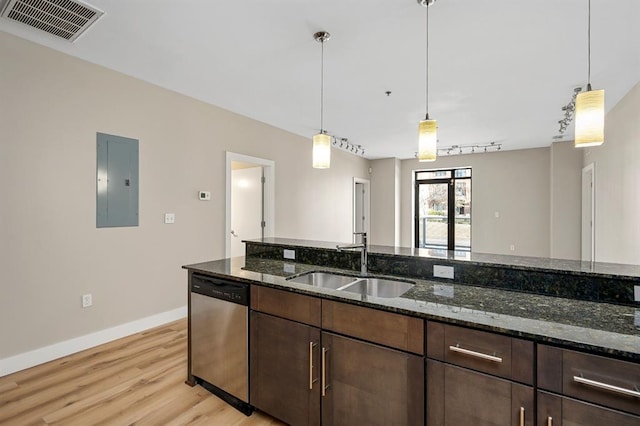 kitchen with visible vents, dark brown cabinets, a sink, electric panel, and stainless steel dishwasher