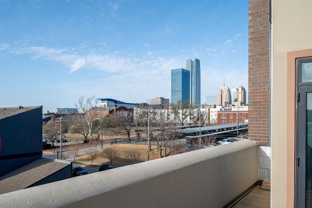 balcony featuring a view of city