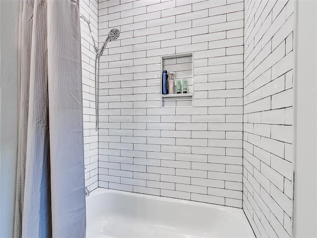 full bath featuring shower / bathtub combination with curtain