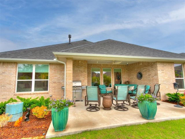 209 Pont Neuf Ct, Edmond, OK 73034 - view of patio / terrace with an outdoor kitchen