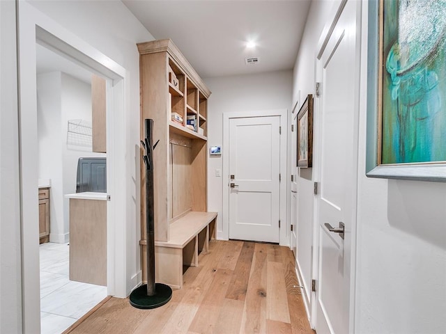 209 Pont Neuf Ct, Edmond, OK 73034 - mudroom with light wood-style flooring