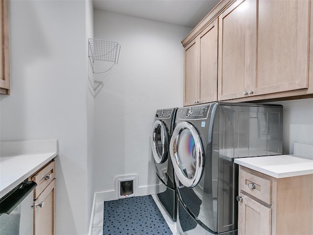 209 Pont Neuf Ct, Edmond, OK 73034 - laundry room featuring cabinet space, washing machine and dryer, and baseboards