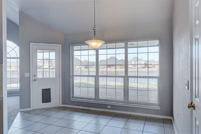 interior space with lofted ceiling and a healthy amount of sunlight