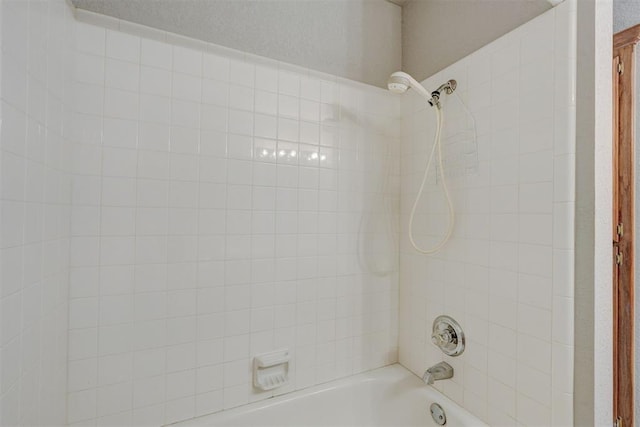 full bathroom with bathing tub / shower combination