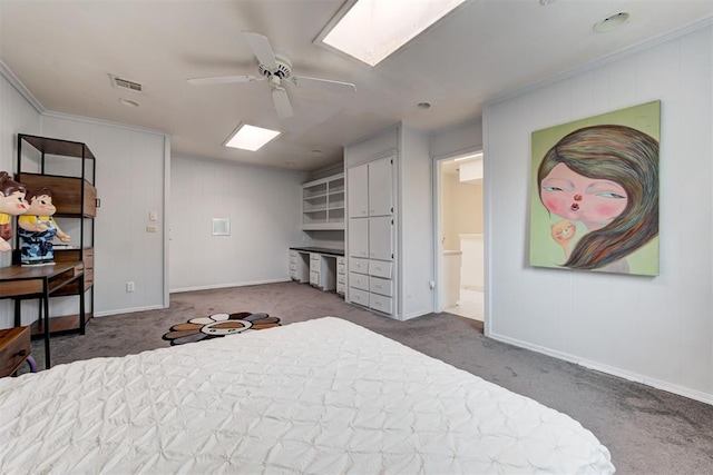 carpeted bedroom with visible vents, baseboards, ceiling fan, and crown molding