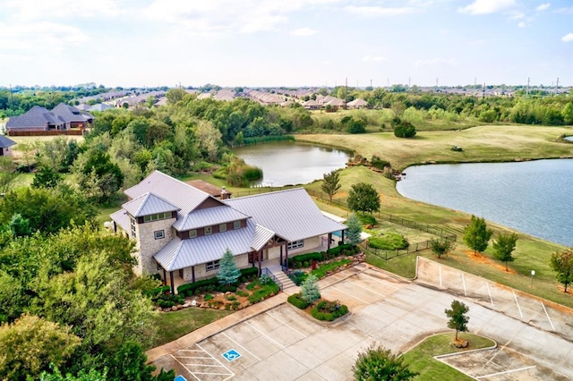 drone / aerial view with a water view