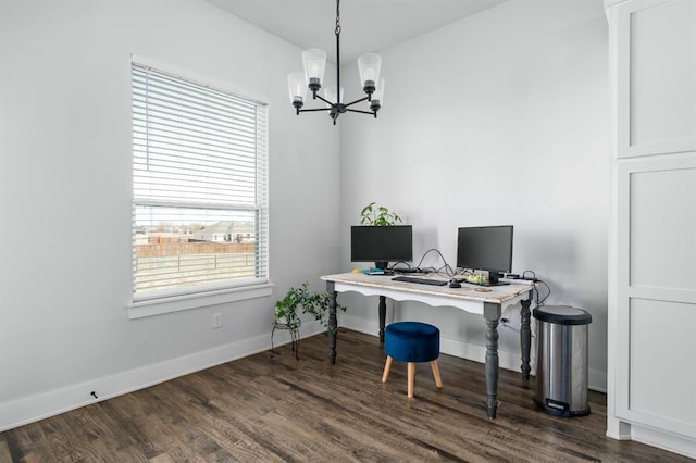 office featuring a notable chandelier, dark wood-style floors, and baseboards