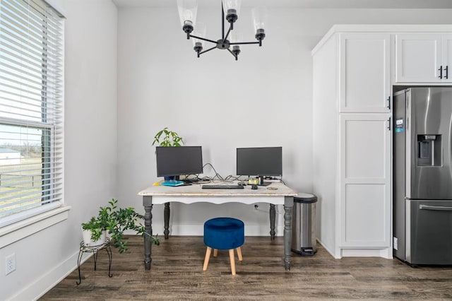 office featuring baseboards, a notable chandelier, and dark wood-style flooring