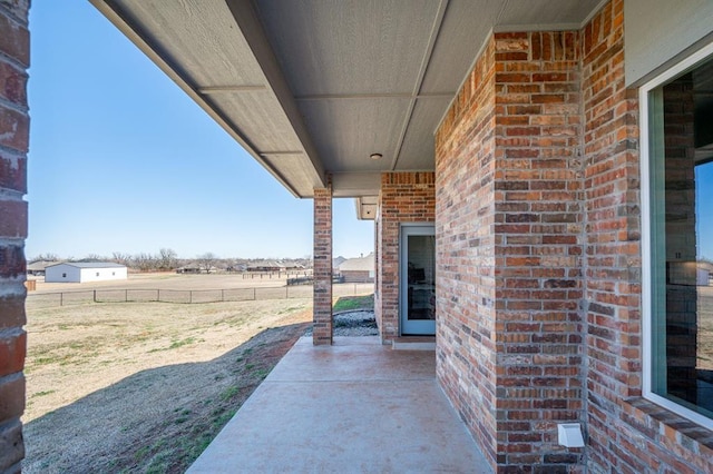 view of patio / terrace with fence