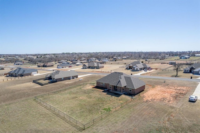 bird's eye view featuring a residential view and a rural view