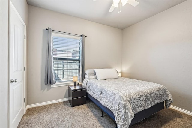 bedroom featuring carpet flooring, a ceiling fan, and baseboards