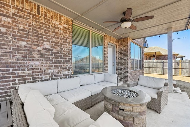 view of patio / terrace featuring an outdoor hangout area, ceiling fan, and fence