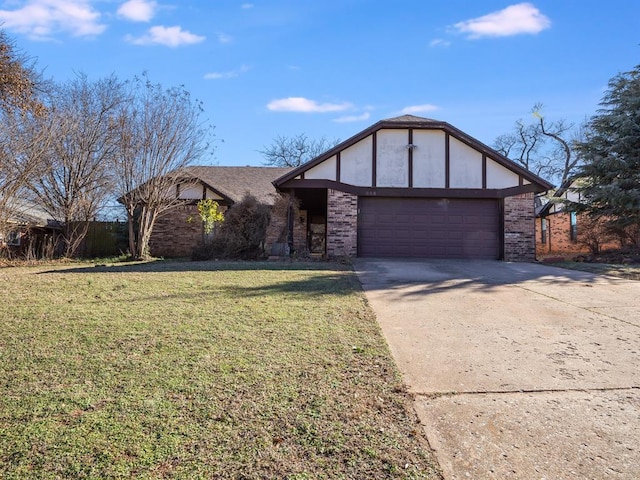 view of front of home featuring concrete driveway, a garage, brick siding, and a front yard