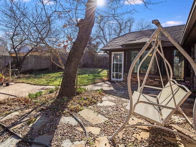 view of yard with a patio and fence