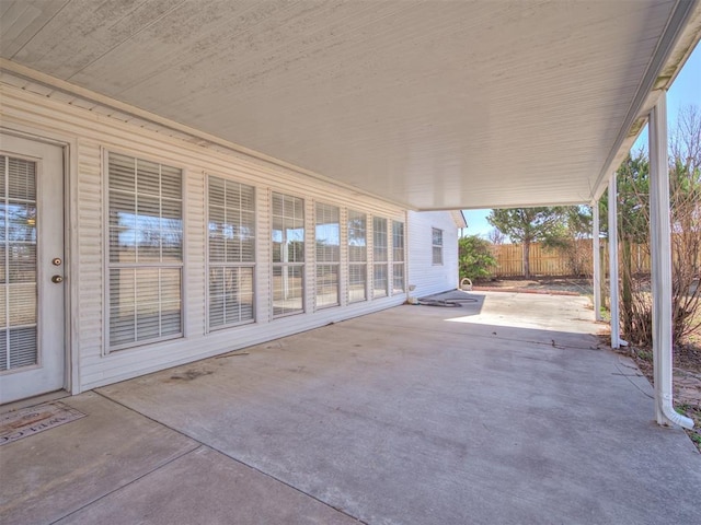 view of patio / terrace featuring fence