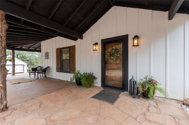 doorway to property with board and batten siding