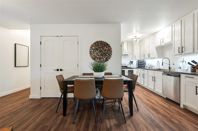 dining space featuring baseboards and dark wood-style floors