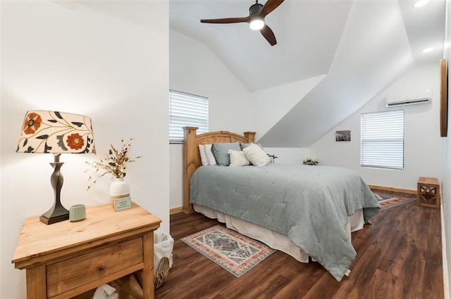 bedroom featuring lofted ceiling, a ceiling fan, a wall mounted AC, dark wood finished floors, and baseboards