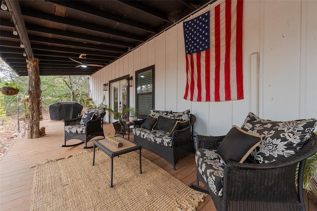 view of patio / terrace with french doors, an outdoor hangout area, and a wooden deck