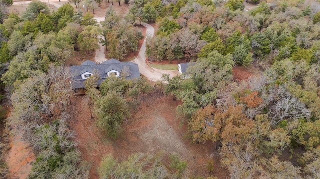 aerial view featuring a view of trees