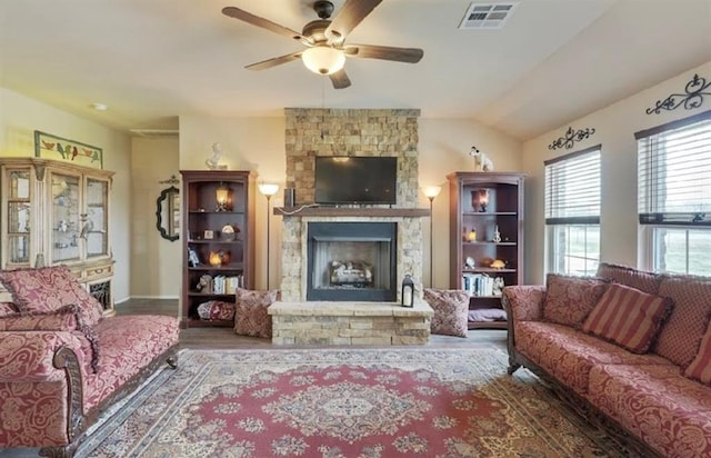 42195 Elles Way, Shawnee, OK 74804 - living area featuring ceiling fan, a fireplace, and wood finished floors