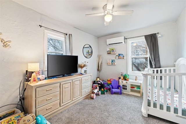 carpeted bedroom featuring a textured wall, a ceiling fan, and a wall unit AC