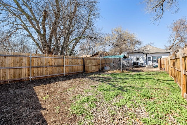 view of yard featuring a fenced backyard