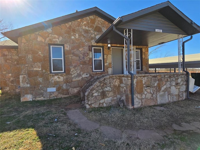 1400 NE 27th St, Oklahoma City, OK 73111 - view of front of house featuring stone siding and crawl space
