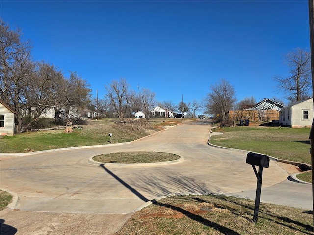 view of road with curbs