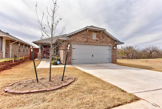 view of front of property with a front lawn, an attached garage, brick siding, and driveway