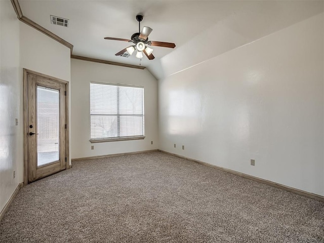 empty room featuring baseboards, visible vents, carpet floors, ceiling fan, and ornamental molding