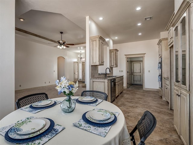 dining room featuring visible vents, baseboards, ceiling fan, recessed lighting, and arched walkways