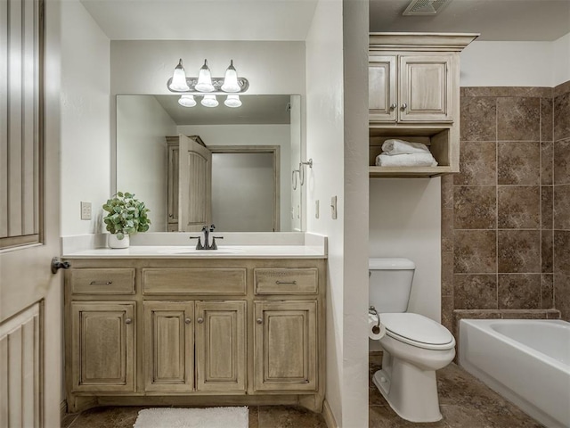 bathroom with visible vents, toilet, and vanity