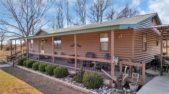 view of home's exterior featuring metal roof