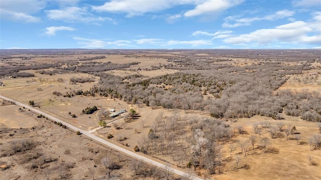 birds eye view of property with a rural view and view of desert