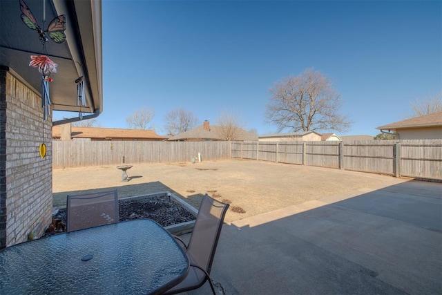 view of patio with a fenced backyard