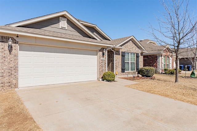 ranch-style house featuring brick siding, driveway, a garage, and roof with shingles