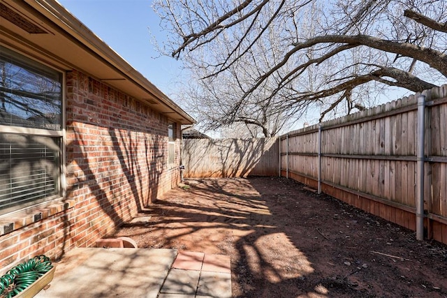 view of patio with a fenced backyard